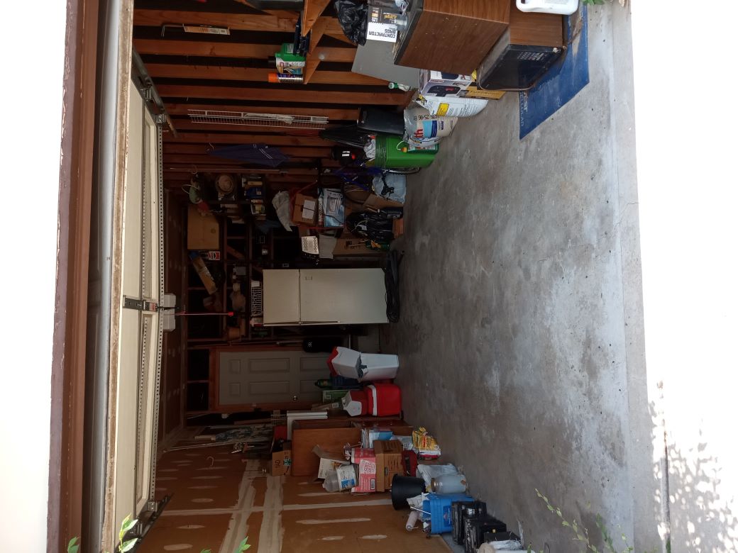 Freezer removal containing 30 gallons of water with bad food. Several garbage bags of bad frozen food.
Yard debris. Garage junk. Magazines, empty boxes, paper bags.